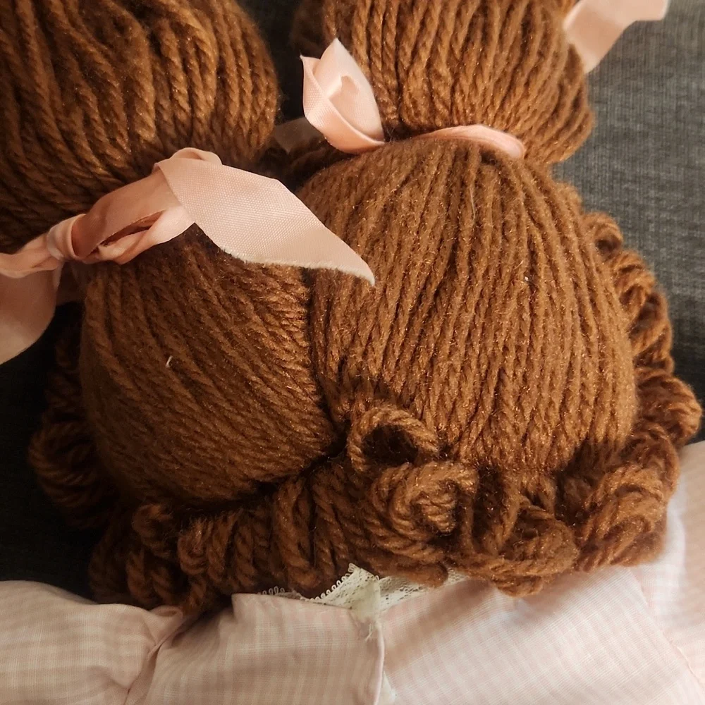 Charming Pink Doll with Curly Brown Hair